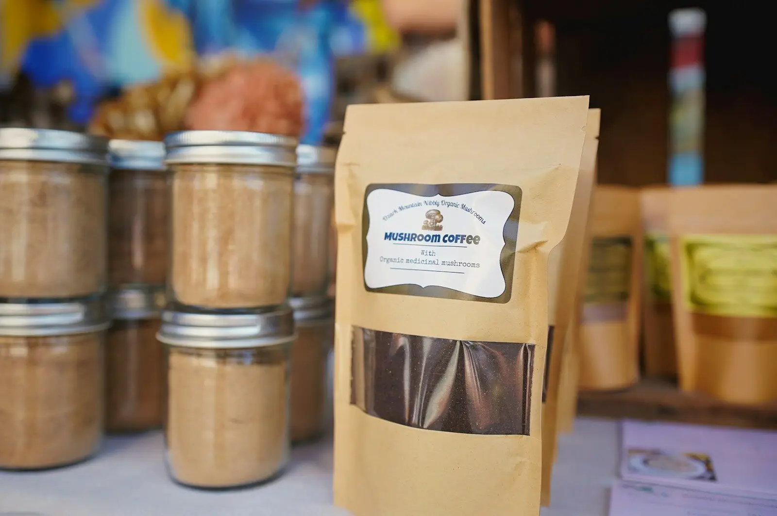 mushroom coffee A table topped with lots of jars filled with food
